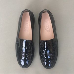 Tod's black leather platform loafers